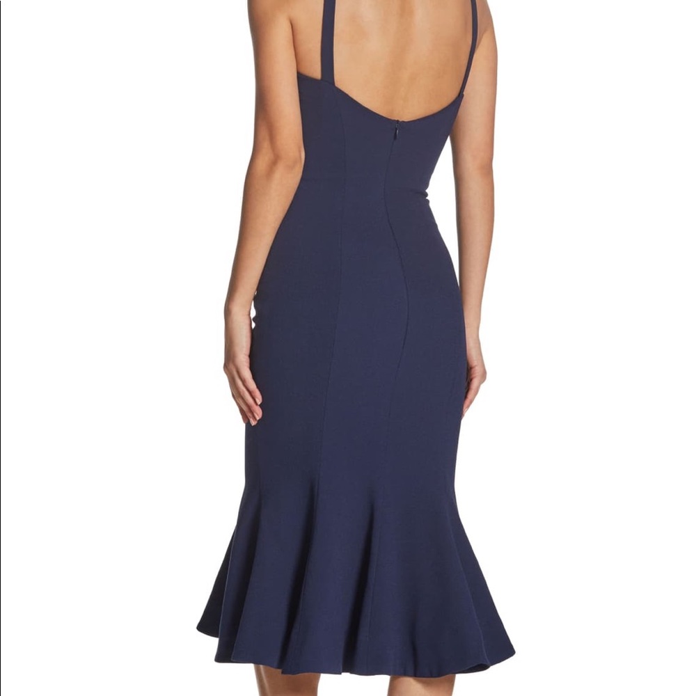 The dress is a tiny bit big on me, navy color